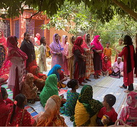 In this picture you see us, Farhana Tasnuva and Madeline Langley, in the countryside in Bangladesh talking with women about their experiences and ideas.